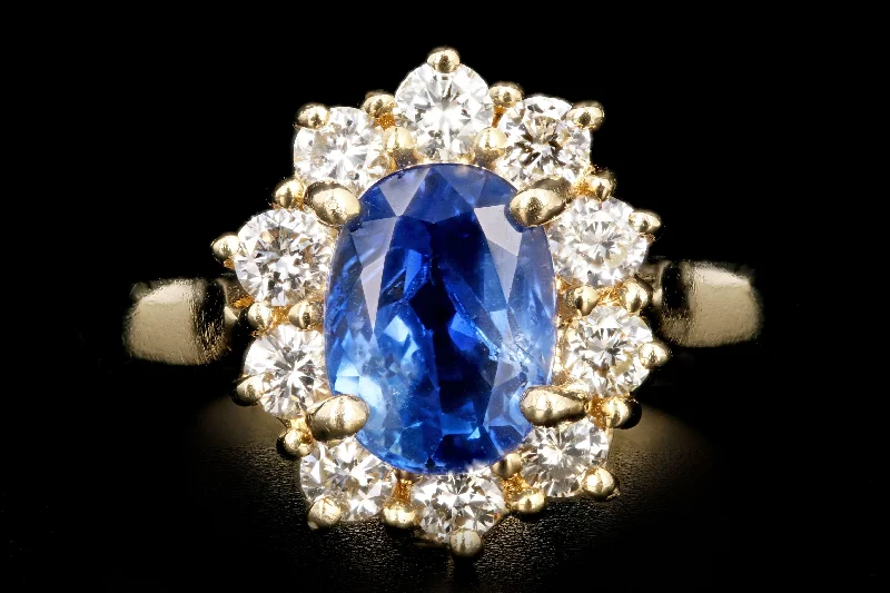 Modern 14K Yellow Gold 2.18 Natural Sapphire and Diamond Halo Ring