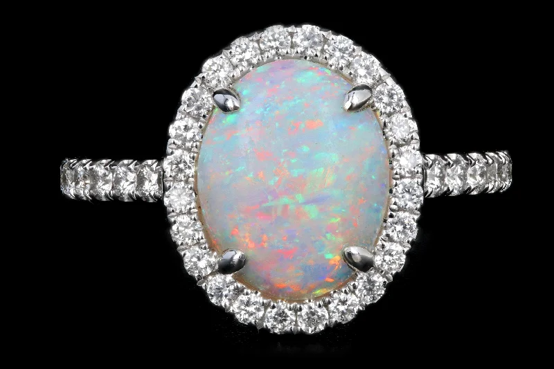 New 14K White Gold 1.29 Carat Oval Cut Opal and Diamond Ring