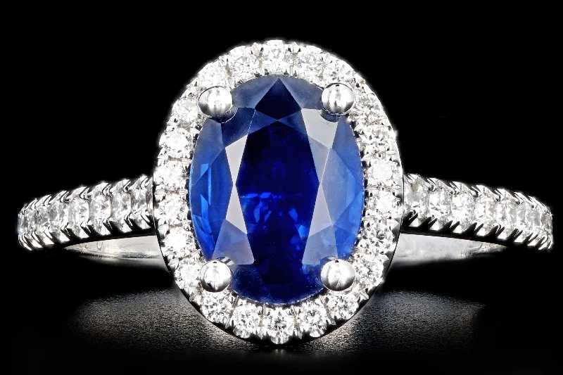 New 14K White Gold 1.58 Carat Oval Cut Sapphire and Diamond Halo Ring